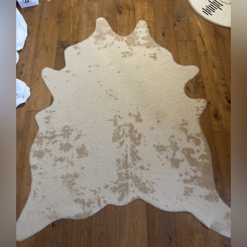 ivory printed faux cowhide area rug
